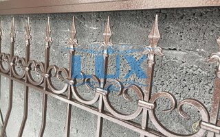 кованая дутая решетка на окно